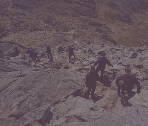Leading a mixed group off Tryfan in North Wales